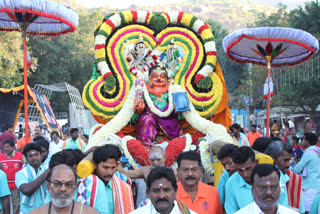 Swami and Ammavar wandered over the ghost carriage to the devotees