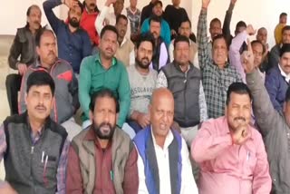 protest on demand for outstanding salary in dhanbad