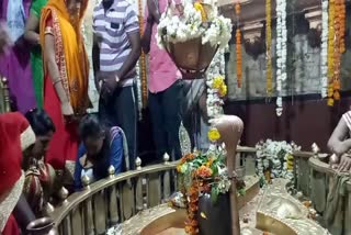 Devotees worship at Karneshwar Dham