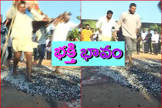 Devotees walking on fire in the shade Someswara temple at nalgonda