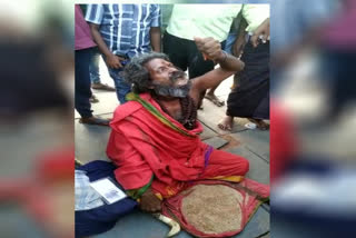 a man eating sand from 20 years