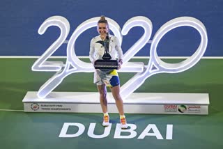 Halep battles past Rybakina in Dubai for 20th career title