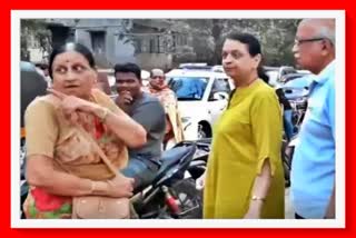 woman scolds footpath bike rider in pune