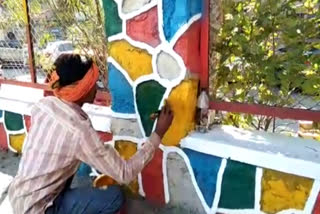 Painting being done on the walls of Akshardham Society delhi