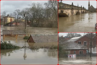 Residents in Shrewsbury in western England, piled up sandbags and used water pumps to clear their flooded properties on Monday as warnings of further flooding were issued for an already waterlogged region.