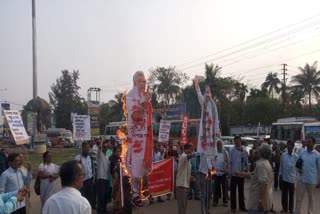 suci workers burned effigi of narendra modi and amit shah