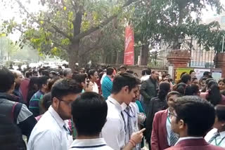 parents bless children with good marks in board exam at dwarka exam center in delhi