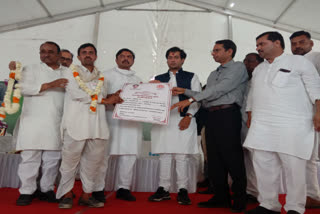 Certificates of crop loan waiver scheme distributed to farmers