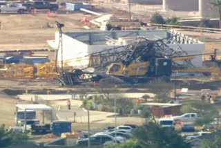 A large construction crane collapsed Friday morning outside SoFi Stadium