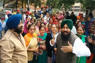 parents protest in front of school