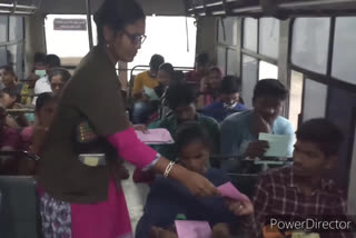 conducters Offering leaflets along with bus tickets in nalgonda district