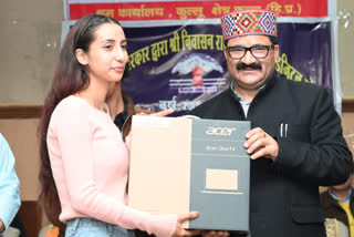 govind thakur distributed laptops in kullu