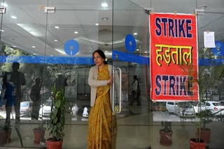 bank unions announce strike on march 27 opposing mergers