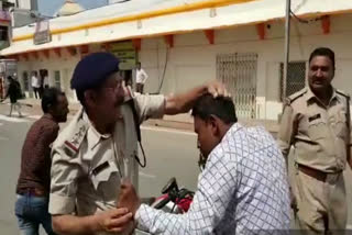 Police beat up young man for not parking his bike in tikamgarh