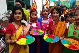 bhangore celebrating basanta utsav with flower and ayurvedic colour