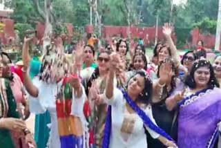 women played Holi with herbal colors and flowers In Faridabad