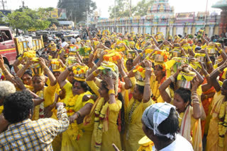 Swami is the little girl carrying their kavadi