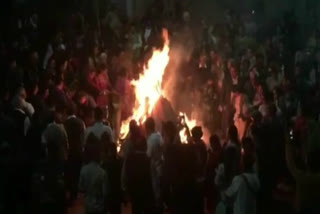 people wished peace prevail in country in holika dahan ritual in ghazibad