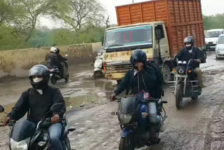 Waterlogging in broken roads after rain in vikaspuri area delhi