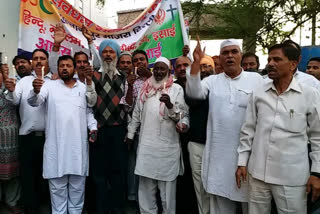 rally held in Mangolpuri with candle march in Delhi violence