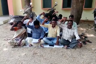 Dharna of field assistants for circular cancellation at nizamabad