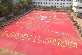 Students of Everwin Vidhyashram school in Kolathur, Chennai create a mosaic of 'wash hands, live long' using around 25,000 soaps to create awareness over  COVID19.