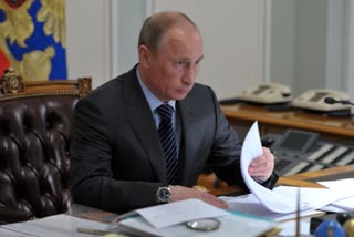 Putin signs Russia constitutional reform law