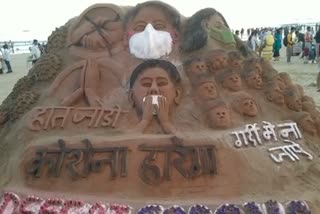 Corona Awareness from sand art at Juhu Choupati