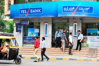 yes bank reports rs 18564 cr loss for dec quarter