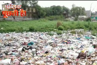 DCM Colony's pond is piled with dirt