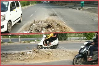 Fear of accident from debris lying in main road in Dwarka