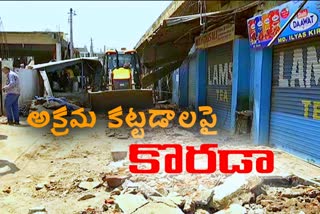 illegal constructions demolish on road sides in nizamabad