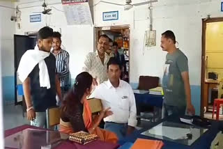 Manavar Municipality president's husband along with a woman councilor