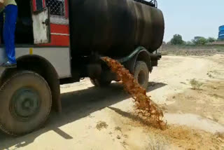 Industrial waste is being thrown in the open