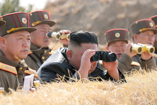 North Korean leader Kim Jong Un supervises an artillery firing competition between army units in the country's west in North Korea, on Friday.