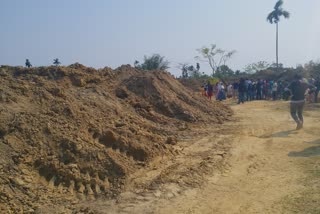 villegers protest  agibest dumping clay