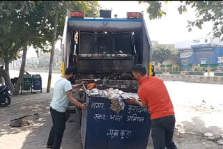 Municipal employees doing work for people