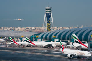 UAE to suspend flights amid coronavirus  Saudi Arabia imposes curfew amid COVID-19  COVID-19 in United Arab Emirates  UAE emergency amid COVID-19  சவூதி அரேபியாவில் ஊரடங்கு உத்தரவு அமல்!  துபாய் விமான சர்வதேச விமான நிலையம், கரோனா பாதிப்பு, சவூதி அரேபியா