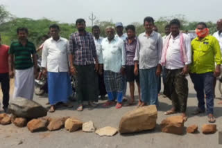 The road was closed with stones due to lockdown at Kuchipudi Suryapet