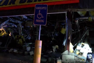 A suspected tornado heavily damaged a store and other structures Tuesday in northern Mississippi