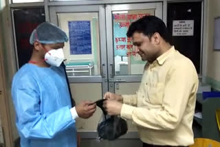 free mask distributed to staff at pravesh chandra hospital at shastri park in delhi