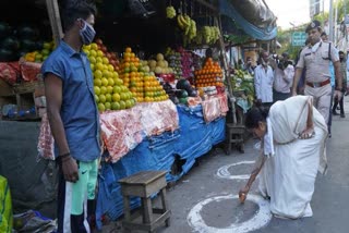 Mamata Banerjee seen directing officials and vendors to practice social distancing