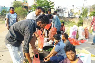 bjp leaders distributing free vegetables  at parvathi puram