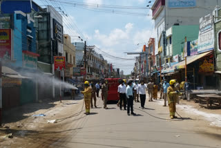 ramnad collector inspects sanitation spray work at market place