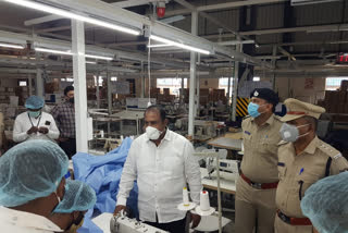 Garment employees preparing the gown