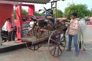 due-to-the-exhaust-of-petrol-he-brought-the-two-wheeler-bull-into-the-car