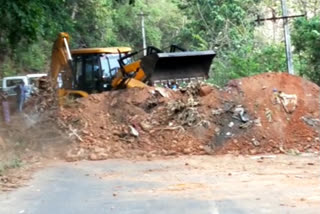 Corona Background: Kodagu-Kerala Interstate Road Connection Band