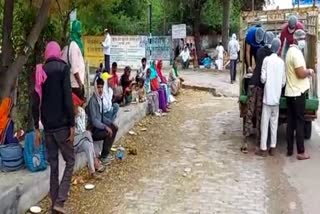 The workers are going to their village on foot