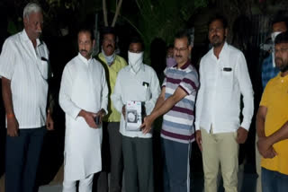 tdp leader distributed maks and sanitizers worth 5 lakhs