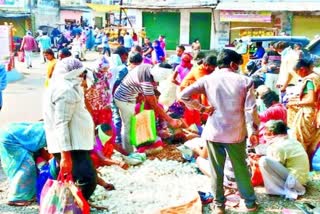 keep distance between two people at markets and kirana general stores in  kumaram bheem asifabad district